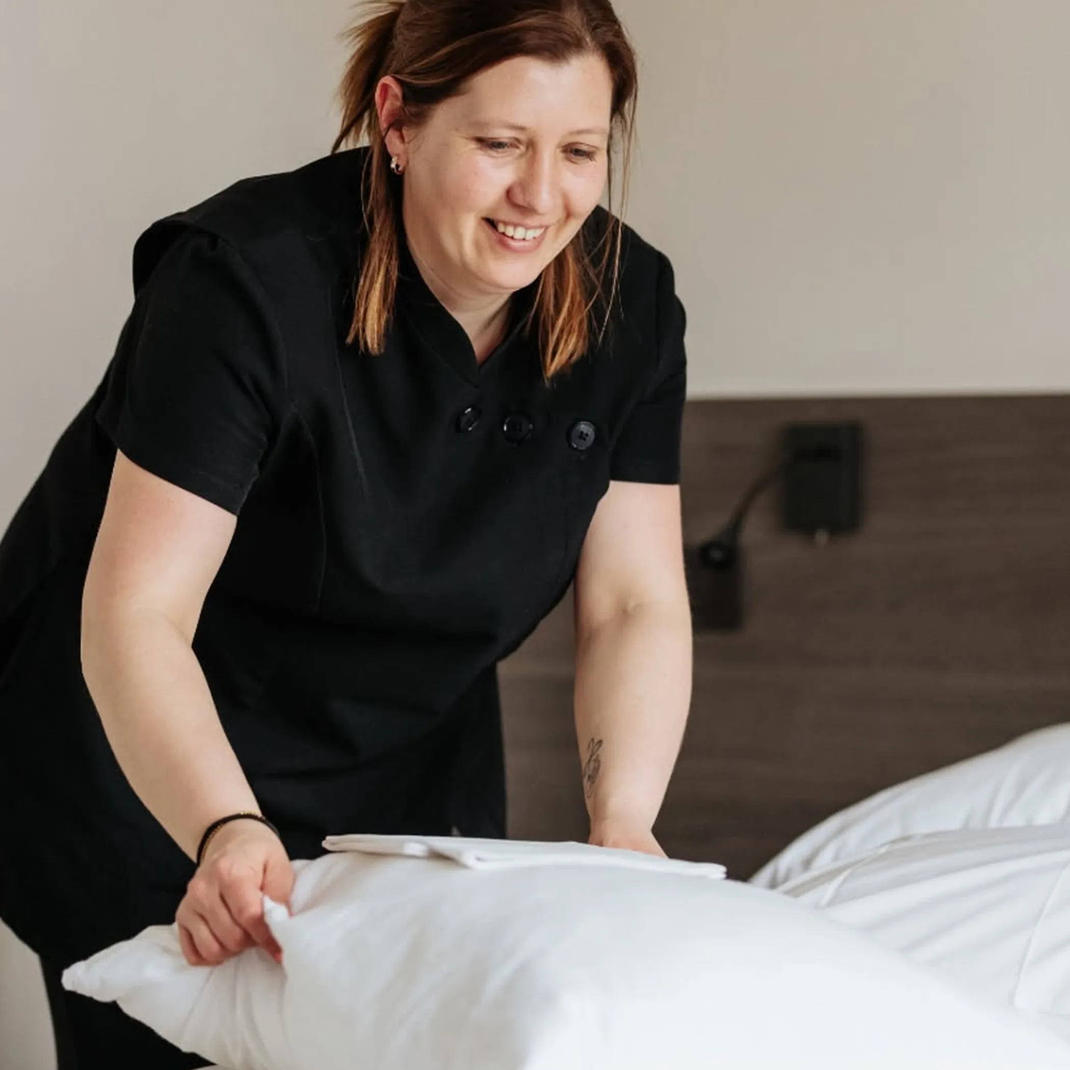 hospitality worker performing tourism job